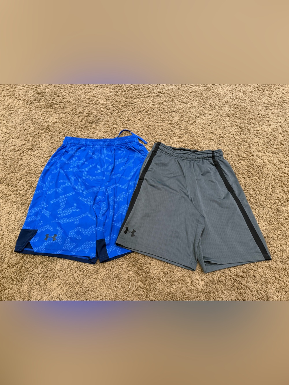 Two pairs of Under Armour athletic shorts